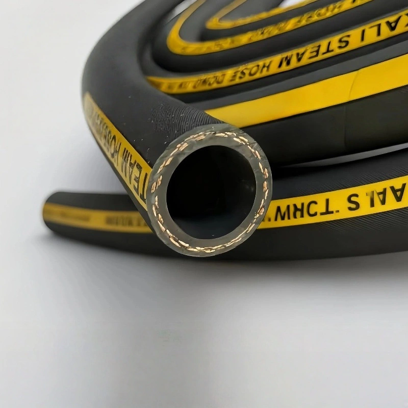 black color steam hose reel is put on the desk to show.